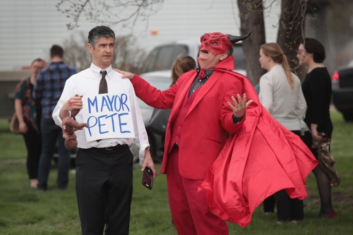 DES MOINES, IOWA - APRIL 17: Anti-gay and pro-life demonstrators, Gary Boisclair (L) and Randall Terry, with The Society for Truth and Justice, protest outside of a campaign event hosted by Democratic presidential candidate and South Bend, Indiana Mayor Pete Buttigieg on April 17, 2019 in Des Moines, Iowa. Buttigieg is on his first visit to the state since announcing that he was officially seeking the Democratic nomination during a rally in South Bend on April 14. 
