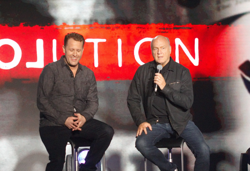 Pastor Greg Laurie (right) speaks about the background of the film "Jesus Revolution." 
