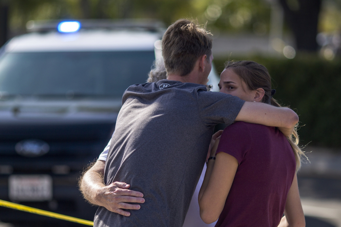 People embrace outside the Congregation Chabad synagogue on April 27, 2019 in Poway, California. A gunman opened fire at the synagogue on the last day of Passover leaving one person dead and three others injured. The suspect is in custody. 
