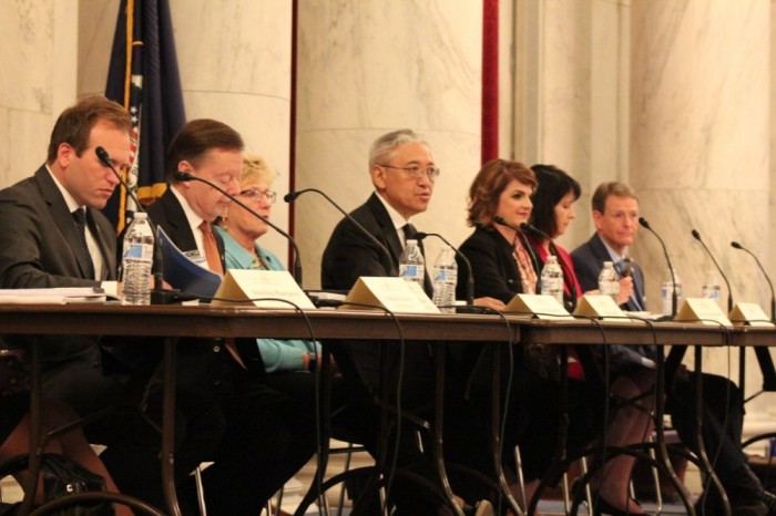 U.S. Commission on International Religious Freedom Chair Tenzin Dorjee (M) speaks during a rollout event for the commission's 2019 annual report in Washington, D.C. on April 29, 2019. He is joined in the photograph by other USCIRF commissioners (left to right): Johnnie Moore, Gary Bauer, Gayle Manchin, Kristina Arriaga, Nadine Maenza and Tony Perkins.