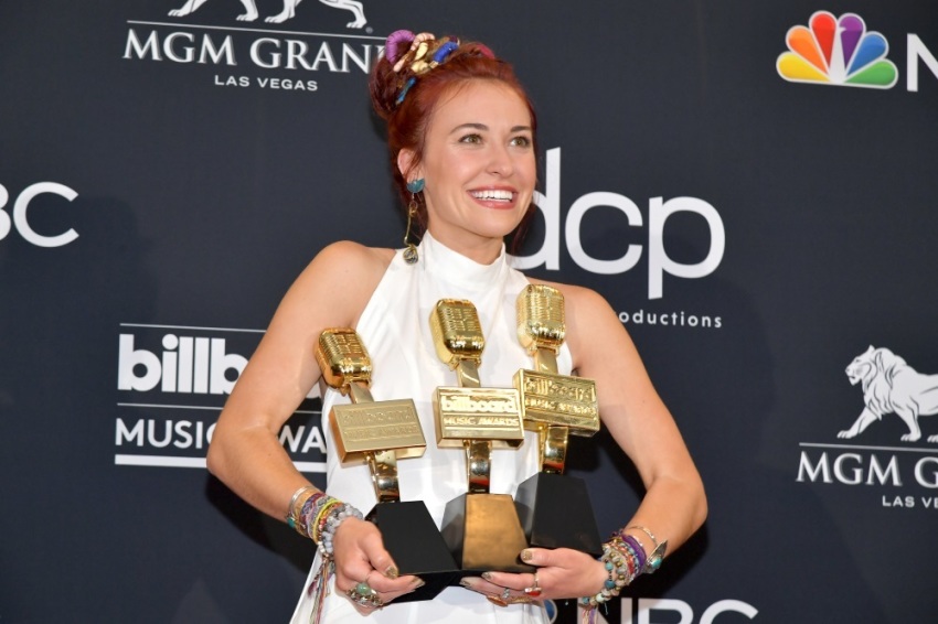 Lauren Daigle poses with awards for Best Christian Artist, Top Christian Album for 'Look Up Child,