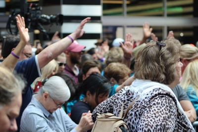 Pro-life supporters pray at the 'Alive From New York' event hosted by Focus on the Family in Times Square New York City on Saturday May 4, 2019.