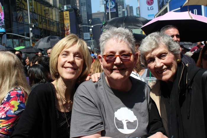Mary Pendergraft (C) draws support from Manhattan residents Lee Mason (L) and Bettyanne McDonough (R) at the 'Alive From New York' event hosted by Focus on the Family in Times Square New York City on Saturday, May 4, 2019.