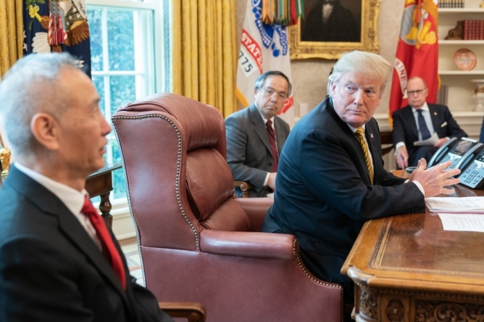 President Donald J. Trump is joined by United States Trade Representative Ambassador Robert Lighthizer, Secretary of the Treasury Steven Mnuchin, Cabinet members and White House senior advisers, as he meets with Chinese Vice Premier Liu He Thursday, April 4, 2019, in the Oval Office of the White House, following continued U.S.–China trade talks. 