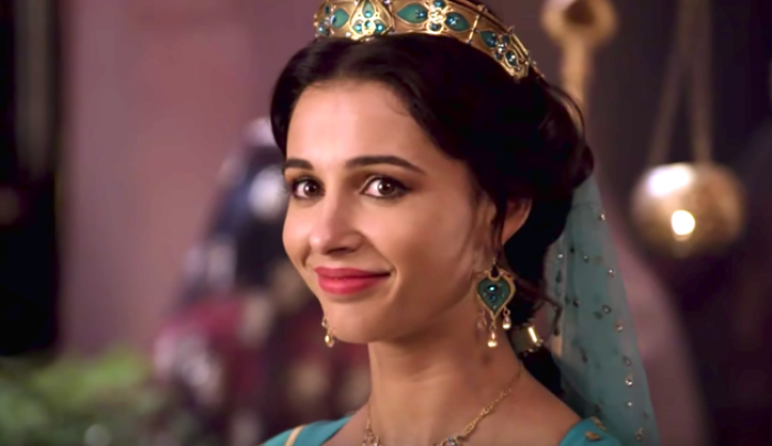 Naomi Scott on set of Disney's Aladdin for Speechless special look video, May 2019.