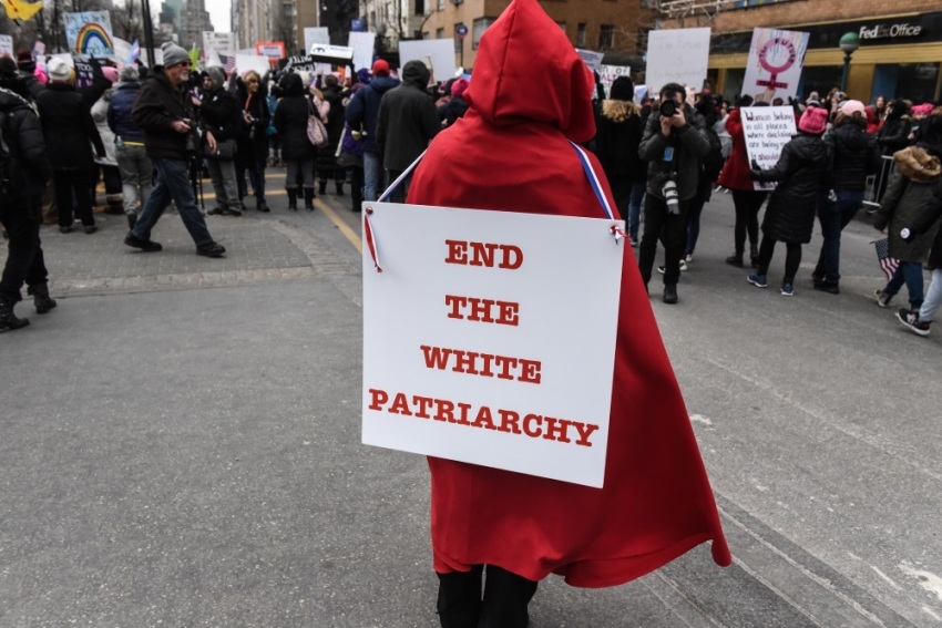A woman wears a red robe from A Handmaid's Tale while participating in the Women's March on January 19, 2019 in New York City.