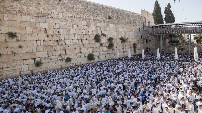 Jewish men pray at the Western Wall in Jerusalem Old City during Yom Yerushalayim (Jerusalem Day), June 2, 2019. 