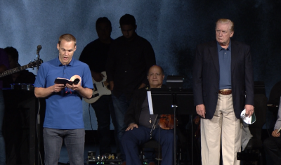 Pastor David Platt of McLean Bible Church in Vienna, Va., reads 1 Timothy 2:1-6 moments before praying for President Donald Trump who made a brief unannounced visit on Sunday June 1, 2019.