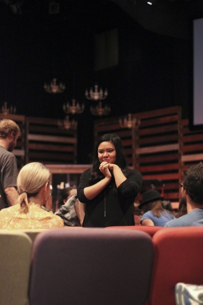 Danielle De Guzman greets participants of Elevate Young Adult Ministry in Collin County, Texas.