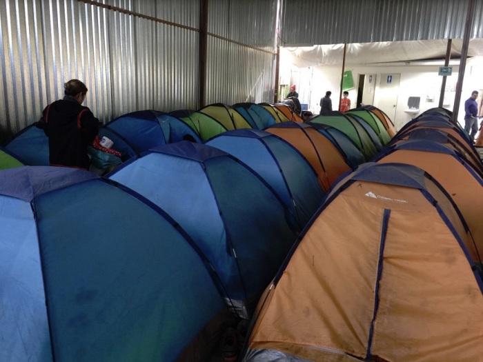 Tents are set up to provide shelter for migrants and asylum seekers inside of a warehouse in Tijuana, Mexico in June 2019.