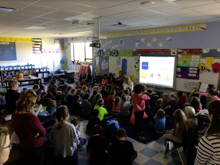 Students attend a "Church Anywhere" after-school church service run by First Capital Christian Church at North Harrison Elementary School in Ramsey, Indiana. 