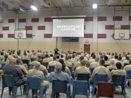 Inmates attend a "Church Anywhere" service run by volunteers affiliated with First Capital Christian Church at the Branchville Correctional Facility in Branchville, Indiana. 