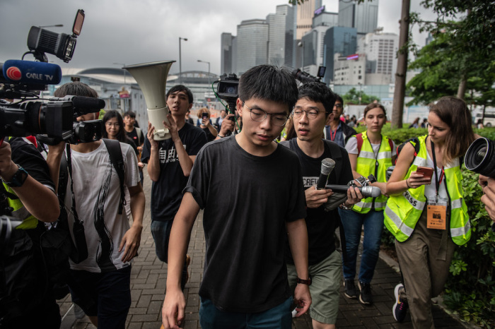 Pro-democracy activist Joshua Wong speaks to the media outside the Legislative Council shortly after being released from prison on June 17, 2019 in Hong Kong, Hong Kong. Hong Kong pro-democracy activist, Joshua Wong, said on Monday after being released from jail that Chief Executive Carrie Lam must step down.