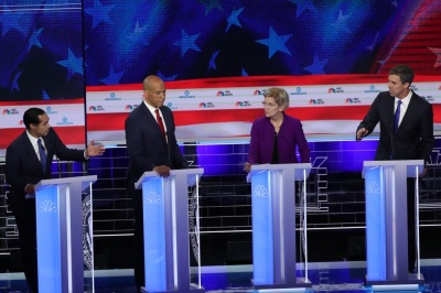 Former housing secretary Julian Castro, Sen. Cory Booker (D-NJ) Sen. Elizabeth Warren (D-MA) and former Texas congressman Beto O'Rourke take part in the first night of the Democratic presidential debate on June 26, 2019 in Miami, Florida. A field of 20 Democratic presidential candidates was split into two groups of 10 for the first debate of the 2020 election, taking place over two nights at Knight Concert Hall of the Adrienne Arsht Center for the Performing Arts of Miami-Dade County, hosted by NBC News, MSNBC, and Telemundo.