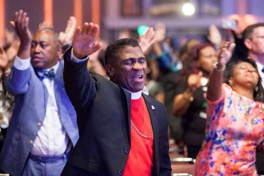 Pastors worship at the Global United Fellowship gathering in 2018.