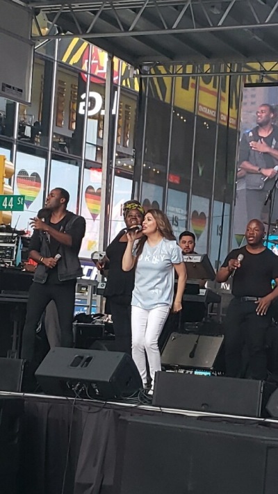 Alma Rivera and band worshiping during Jesus Week in Times Square, N.Y., June 29, 2019.