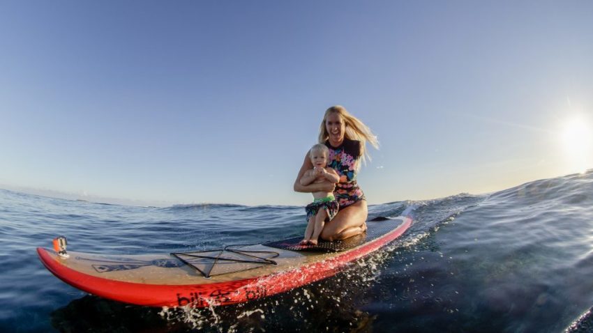 Bethany Hamilton and her son appear in the film "Bethany Hamilton: Unstoppable," July 2019.