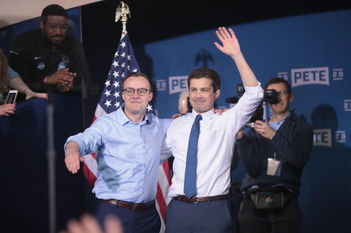 Chasten Glezman (L) joins his husband South Bend Mayor Pete Buttigieg on stage after Buttigieg announced that he will be seeking the Democratic nomination for president during a rally in the old Studebaker car factory on April 14, 2019 in South Bend, Indiana.