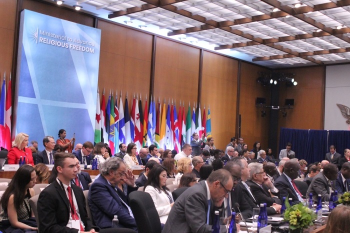 Attendees look on as Vice President Mike Pence speaks at the second State Department Ministerial to Advance Religious Freedom in Washington, D.C., on July 18, 2019.