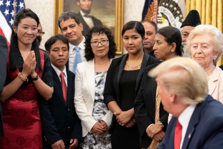 Survivors of religious persecution meet with President Donald Trump at the White House on July 17, 2019.