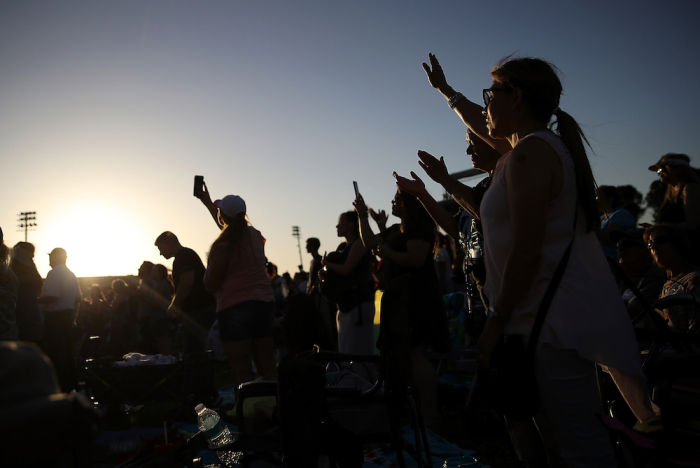 Attendees sing during Franklin Graham's 'Decision America' California tour at the Stanislaus County Fairgrounds on May 29, 2018 in Turlock, California. 