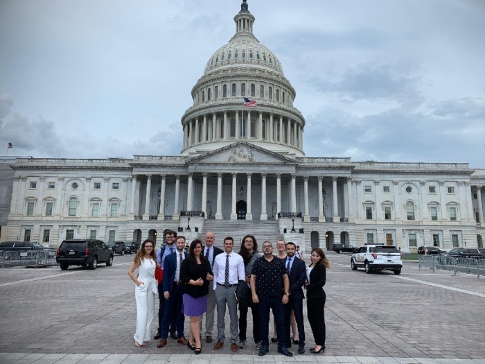 Syrian immigrants with temporary protected status who met with members of Congress pose for a picture outside of the U.S. Capitol Building in Washington, D.C. on July 17, 2019. 