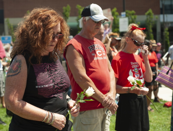 People gather for a vigil for the victims of the mass shooting that occurred over night, at the Levitt Pavilion on August 4, 2019 in Dayton, Ohio. In the second mass shooting in the U.S. within 24 hours a gunman left nine dead and another 27 wounded after only a minute of shooting. 
