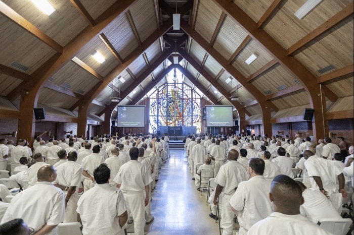 Hundreds of inmates gather for a Gateway Church service at the H.H. Coffield Unit in Anderson County, Texas.