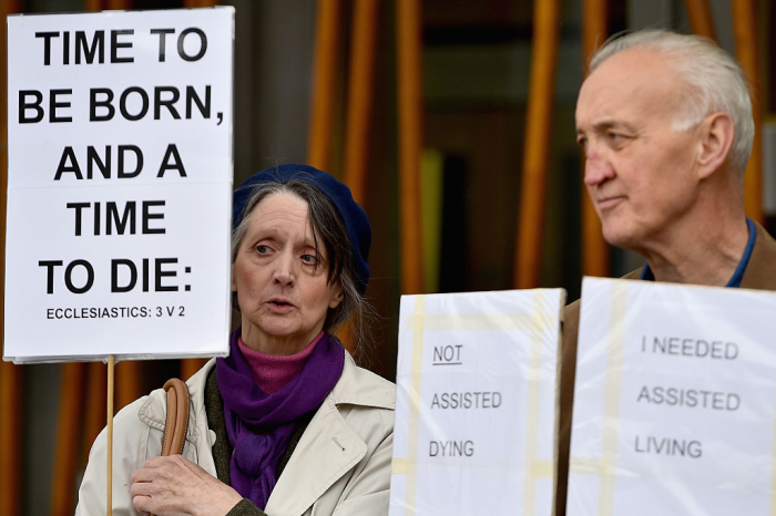 Campaigners against assisted suicide hold a rally outside Holyrood in Edinburgh, Scotland, on May 27, 2015. 