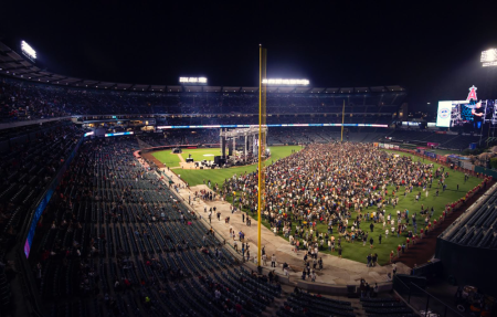 Attendees respond to Laurie's Gospel invitation at the second night of SoCal Harvest in Anaheim, California, August 24, 2019.