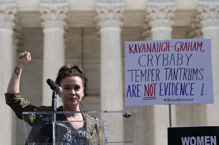Actress Alyssa Milano speaks during a rally in front of the U.S. Supreme Court in Washington, D.C., on Sept. 28, 2018. 