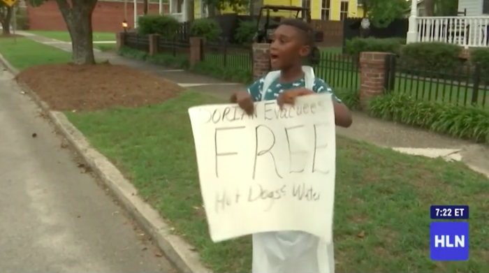Jermaine Bell, 6, used his birthday money to buy hundreds of hot dogs and serve them for free to Hurricane Dorian evacuees passing through their South Carolina town.