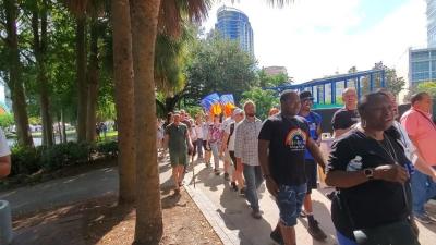 People participate in the Freedom March at Lake Eola Park in Orlando, Florida, on Sept. 14, 2019. 