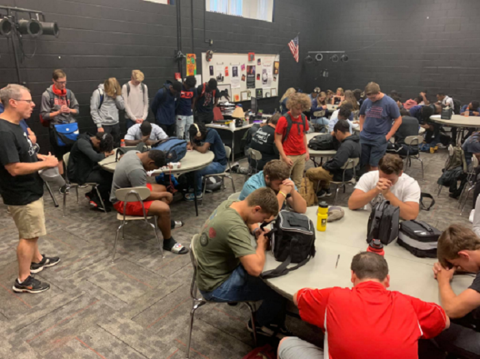 Students at Spalding High School in Griffin, Ga., pray on August 23, 2019.