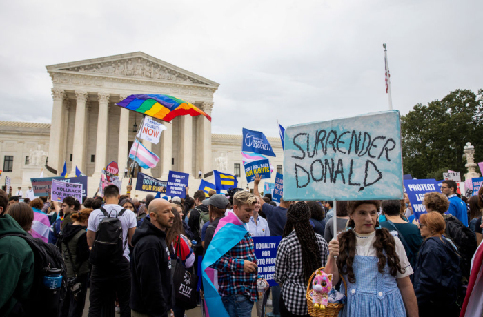 Protesters gather in front of the Supreme Court in Washington, D.C., as it hears arguments on gender identity and workplace discrimination on October 08, 2019.
