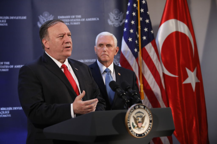 U.S. Secretary of State Mike Pompeo (L) and U.S. Vice President Mike Pence (R) hold a press conference at the U.S. Embassy in Ankara, Turkey, on October 17, 2019. After leading a delegation to press Turkish officials on the recent military campaign in Northern Syria, U.S. Vice President Mike Pence has recently announced that Turkey has agreed to a ceasefire to enable Kurdish-led forces to withdraw. 