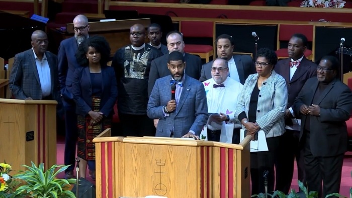 The Rev. Ottis Moss announces a church coalition effort to abolish medical debt at the Trinity United Church of Christ in Chicago, Illinois, on Oct. 20, 2019. 