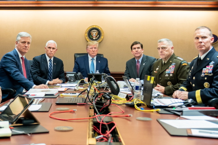 President Donald J. Trump is joined by Vice President Mike Pence, National Security Advisor Robert O’Brien, left; Secretary of Defense Mark Esper and Chairman of the Joint Chiefs of Staff U.S. Army General Mark A. Milley, and Brig. Gen. Marcus Evans, Deputy Director for Special Operations on the Joint Staff, at right, Saturday, Oct. 26, 2019, in the Situation Room of the White House monitoring developments as U.S. Special Operations forces close in on notorious ISIS leader Abu Bakr al-Baghdadi’s compound in Syria with a mission to kill or capture the terrorist. 