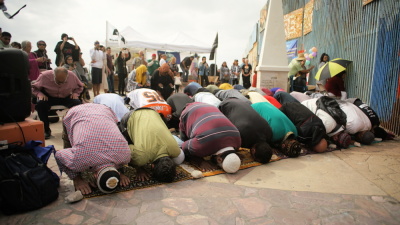 The Border Mosque praying at Friendship Park, San Diego, California.