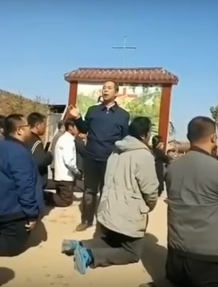 Protesters, including priests, attempt to stop the demolition of a Catholic Church in Guantao County of the People's Republic of China, as seen in video uploaded in October 2019. 