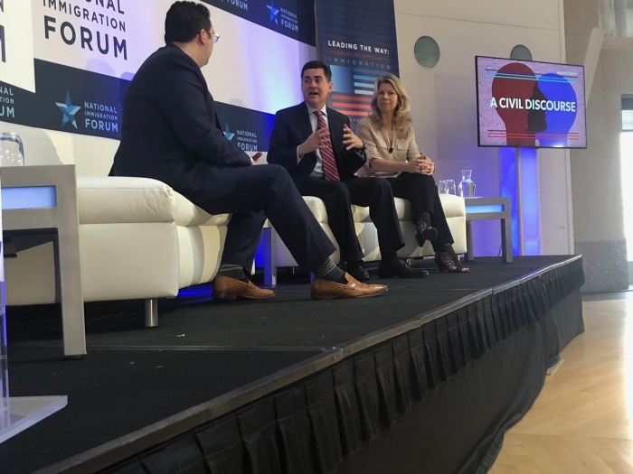 Russell Moore (M) speaks during the National Immigration Forum's 'Leading the Way' summit in Washington, D.C. on Nov. 7, 2019. He is flanked by Cherie Harder of the Trinity Forum (R) and former Obama campaign faith adviser Michael Wear (L) 
