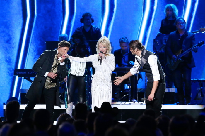 Joel Smallbone and Luke Smallbone of For King & Country and Dolly Parton (M) perform onstage during the 53rd annual CMA Awards at the Music City Center on November 13, 2019 in Nashville, Tennessee.