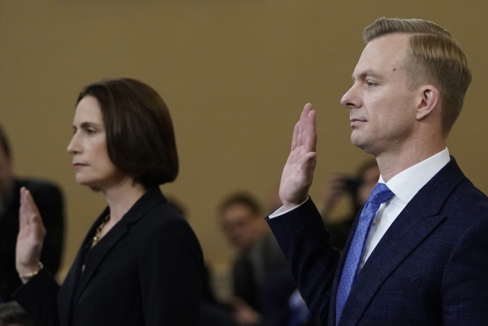 Fiona Hill, the National Security Council’s former senior director for Europe and Russia, and David Holmes, an official from the American embassy in Ukraine, are sworn in prior to testifying before the House Intelligence Committee in the Longworth House Office Building on Capitol Hill November 21, 2019 in Washington, DC. 