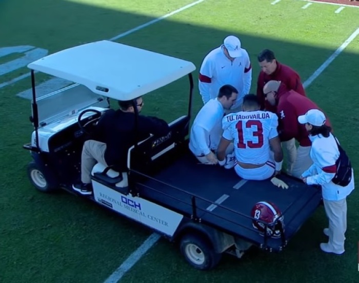 University of Alabama quarterback Tua Tagovailoa is being attended to by medical staff after suffering an injury against Mississippi State on Nov. 16, 2019.