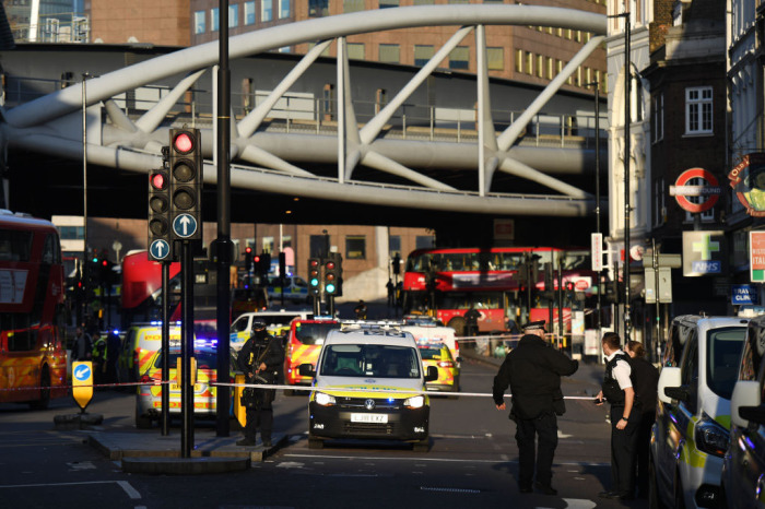 Metropolitan Police officers set up a cordon near Borough Market after a number of people are believed to have been injured after a stabbing at London Bridge, police have said, on November 29, 2019 in London, England. Police said they were called to the stabbing around 2 p.m. local time. Video shared on social media after the incident showed armed officers opening fire on a man who had been pinned down on the bridge walkway. Metropolitan Police said they believed there were several injuries and that a man had been detained. 