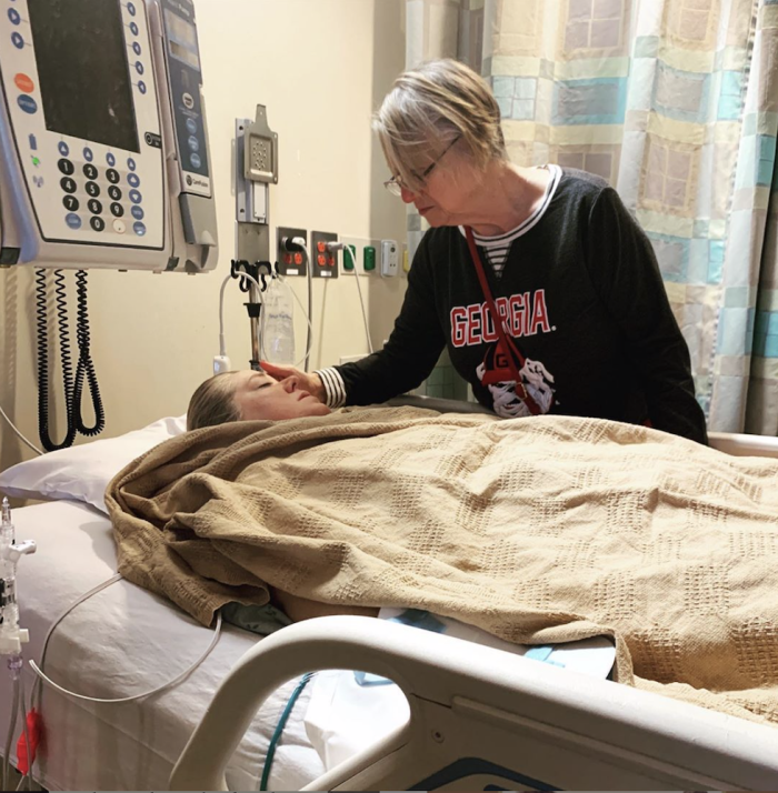 Aimee Powell and her mother in the hospital after she suffers a brain aneurysm, Dec. 1 , 2019.