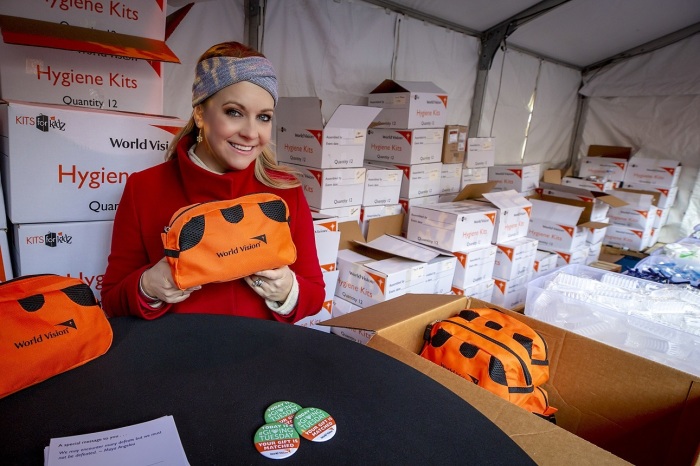 Actress Melissa Joan Hart packs a hygiene kit inside World Vision’s interactive pop-up shop in Bryant Park's Winter Village in Midtown, Manhattan on Tuesday December 3, 2019.