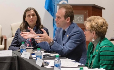 USCIRF Commissioner Johnnie Moore (M) speaks during a meeting with Sudan Prime Minister Abdalla Hamdok in Washington, D.C. on Dec. 5, 2019. He is flanked by USCIRF Vice Chair Gayle Manchin (R) and USCIRF's director of international law and policy Elizabeth Cassidy (L).