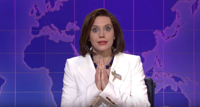 House Speaker Nancy Pelosi, played by comedian Kate McKinnon, mockingly prays for President Donald Trump in a 'Weekend Update' sketch from Dec. 7, 2019. 