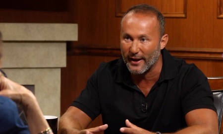 Ahmed "Andy" Khawaja speaks with Larry King in December 2017.